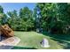 Large grassy yard with an outdoor playhouse at 2168 Sunset Cir, Fort Mill, SC 29715