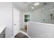 Stylish bathroom features a glass enclosed shower and neutral finishes at 2168 Sunset Cir, Fort Mill, SC 29715