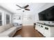Cozy living room with neutral walls, hardwood floors, and a comfortable sofa at 2168 Sunset Cir, Fort Mill, SC 29715