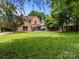 Large manicured backyard with patio area at 217 S Ellis St, Salisbury, NC 28144