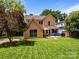 Well-maintained backyard featuring a cozy patio area at 217 S Ellis St, Salisbury, NC 28144