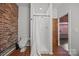 Modern bathroom with glass shower and a view into the next room at 217 S Ellis St, Salisbury, NC 28144