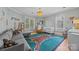 bedroom features a tiger rug, seating area, and a crib at 217 S Ellis St, Salisbury, NC 28144