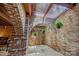 Brick courtyard with hanging plants and stone flooring at 217 S Ellis St, Salisbury, NC 28144