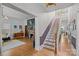 Classic foyer with staircase, fireplace, and hardwood flooring at 217 S Ellis St, Salisbury, NC 28144