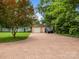 Wide angle shot of detached two car garage with long concrete driveway at 217 S Ellis St, Salisbury, NC 28144