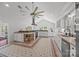Bright, spacious kitchen features white cabinets, large island, and unique tiled floors at 217 S Ellis St, Salisbury, NC 28144