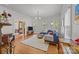 Bright living room featuring hardwood floors and large windows at 217 S Ellis St, Salisbury, NC 28144
