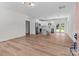 Open-concept kitchen and living space featuring stainless steel appliances, an island and hardwood floors at 2220 Mooresville Rd, Salisbury, NC 28147