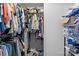 A walk-in closet provides ample storage space for clothing and accessories at 223 Tennessee Trl, Lincolnton, NC 28092