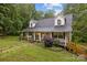 Charming home with a welcoming front porch and beautifully landscaped front yard at 223 Tennessee Trl, Lincolnton, NC 28092
