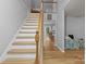 Bright foyer with hardwood floors and stairway access to the upper level at 223 Tennessee Trl, Lincolnton, NC 28092