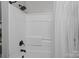 Neat shower area with a shower head and curtain, designed for a refreshing and clean bathing experience at 223 Tennessee Trl, Lincolnton, NC 28092