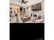 Basement with an electric fireplace, built-in shelves, and stairs leading up to main floor at 2234 Donnington Nw Ln, Concord, NC 28027