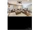 Basement living room with a sectional sofa, ottoman, and accent lighting at 2234 Donnington Nw Ln, Concord, NC 28027