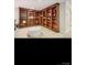 Finished basement with custom built-in bookshelves and extra storage space at 2234 Donnington Nw Ln, Concord, NC 28027