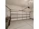 A spacious garage with painted walls and an automatic garage door at 2234 Donnington Nw Ln, Concord, NC 28027