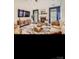 Bright living room with a fireplace, large TV, area rug, and coffered ceiling at 2234 Donnington Nw Ln, Concord, NC 28027