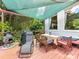 The back deck features a dining area and a grill for outdoor enjoyment at 2325 Perry Rd, Denver, NC 28037