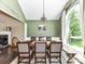 Bright dining room with hardwood floors, a large window, and an elegant chandelier at 2325 Perry Rd, Denver, NC 28037