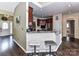 Kitchen with granite countertops, stainless steel appliances, and bar seating at 2325 Perry Rd, Denver, NC 28037