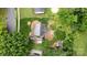 Aerial view of the home, landscaped yard, detached garage and shed at 2507 Birnen Dr, Charlotte, NC 28210