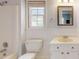 Classic bathroom with shower and tub, vanity, and bright window at 2507 Birnen Dr, Charlotte, NC 28210