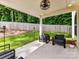 Inviting covered porch with stylish seating, providing an ideal space for outdoor relaxation at 2517 Marlowe Ave, Charlotte, NC 28208