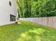 Beautifully landscaped backyard with a privacy fence, perfect for relaxation and outdoor activities at 2517 Marlowe Ave, Charlotte, NC 28208