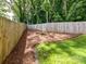 Well-kept backyard with a privacy fence, offering a serene space for outdoor enjoyment and activities at 2517 Marlowe Ave, Charlotte, NC 28208