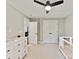 Charming Bedroom includes a white dresser and crib, offering ample space and natural light at 2517 Marlowe Ave, Charlotte, NC 28208
