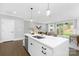 Modern kitchen with a large island, stainless steel appliances, and an open floor plan at 2517 Marlowe Ave, Charlotte, NC 28208