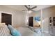 Bedroom with a four poster bed, TV, closet and a peak into the bathroom at 2656 Lee Lawing Rd, Lincolnton, NC 28092