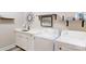 Functional laundry room featuring modern appliances, stylish cabinetry, and plenty of counter space at 2656 Lee Lawing Rd, Lincolnton, NC 28092
