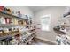 Walk-in pantry with ample shelving for storage, maximizing organization and convenience at 2656 Lee Lawing Rd, Lincolnton, NC 28092