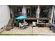 Comfortable outdoor patio with tables, chairs, and a cozy grill at 2656 Lee Lawing Rd, Lincolnton, NC 28092