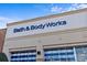 Exterior view of a Bath & Body Works store with blue signage and front windows at 2809 Waycross Dr, Monroe, NC 28110