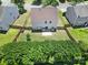 Aerial view of a well-maintained backyard with a privacy fence and patio at 3015 Liddington Rd, Matthews, NC 28105