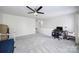 Spacious bonus room with carpet and a ceiling fan is a flexible space at 3015 Liddington Rd, Matthews, NC 28105