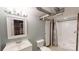 Bathroom features a single vanity, toilet, and a shower with a curtain at 3151 Lynn Mountain Rd, Vale, NC 28168