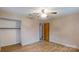 Bedroom features include laminate floors, a ceiling fan, closet, and painted walls at 3151 Lynn Mountain Rd, Vale, NC 28168