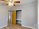 Bedroom features include laminate floors, a closet, and painted walls at 3151 Lynn Mountain Rd, Vale, NC 28168