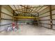 Spacious interior with wooden beams and a functional loft area provides ample storage or workspace at 3151 Lynn Mountain Rd, Vale, NC 28168