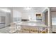 Beautiful kitchen featuring white cabinets, a center island with seating, and updated appliances at 3151 Lynn Mountain Rd, Vale, NC 28168