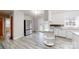 Bright kitchen featuring stainless steel appliances, marble countertops, and white cabinetry at 3151 Lynn Mountain Rd, Vale, NC 28168