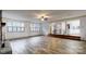 Bright open living room, with stone fireplace, and an open floor plan to the kitchen at 3151 Lynn Mountain Rd, Vale, NC 28168