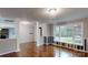 Inviting living room with hardwood floors, large windows, and decorative columns, providing a bright, airy space at 3151 Lynn Mountain Rd, Vale, NC 28168