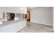 The living room flows into the kitchen with an open floorplan and marble countertops at 3151 Lynn Mountain Rd, Vale, NC 28168