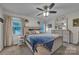 Bright bedroom with a light wood frame bed, ample natural light, and neutral decor at 350 Moose Dr, Stony Point, NC 28678