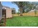 Expansive backyard with a lush lawn and privacy fence at 3822 Topsfield Rd, Charlotte, NC 28211